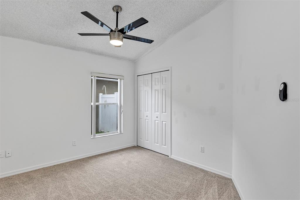 4254 Northern Dancer Way Orlando, FL 32826 - Photo 21 of 38 a view of a livingroom with a ceiling fan