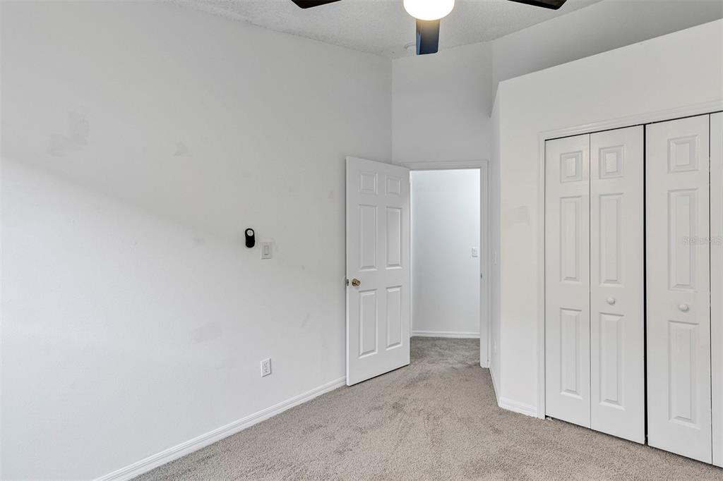 4254 Northern Dancer Way Orlando, FL 32826 - Photo 26 of 38 wooden floor in an empty room