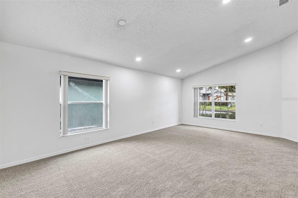 4254 Northern Dancer Way Orlando, FL 32826 - Photo 3 of 38 an empty room with a window