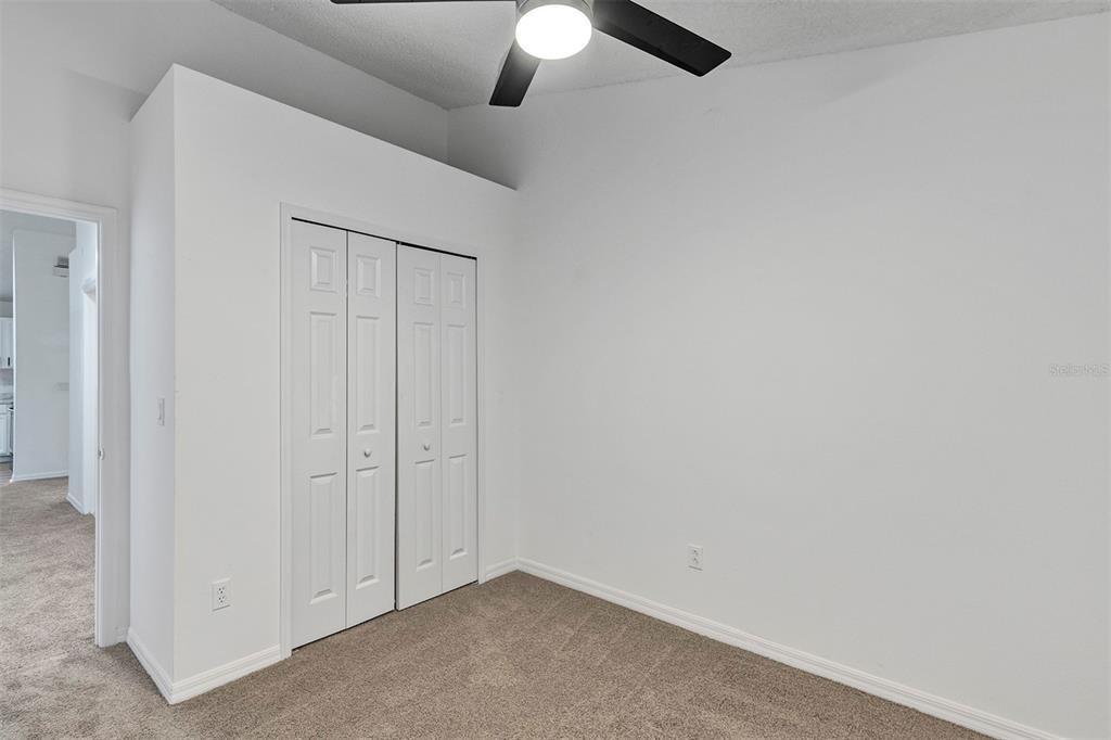 4254 Northern Dancer Way Orlando, FL 32826 - Photo 31 of 38 an empty room with fan