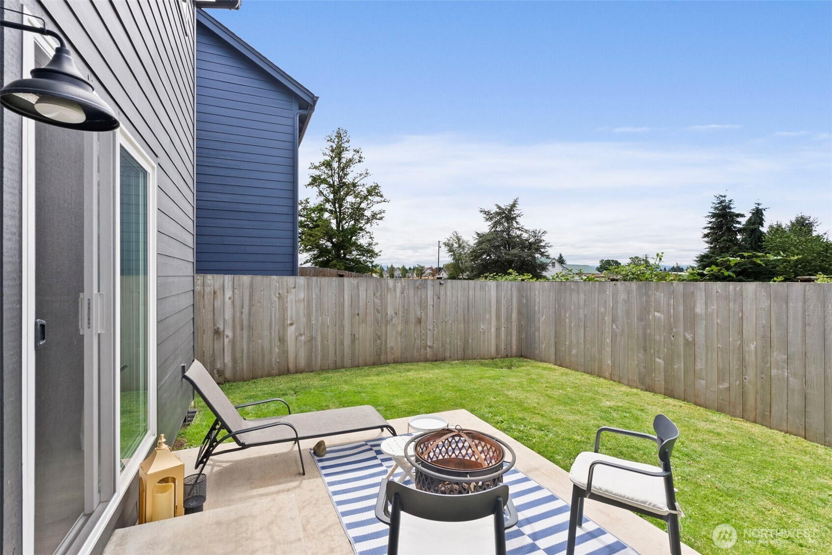 1007 Peach Road, Unit A & B Winlock, WA 98596 - Photo 25 of 28 a view of backyard with a seating space
