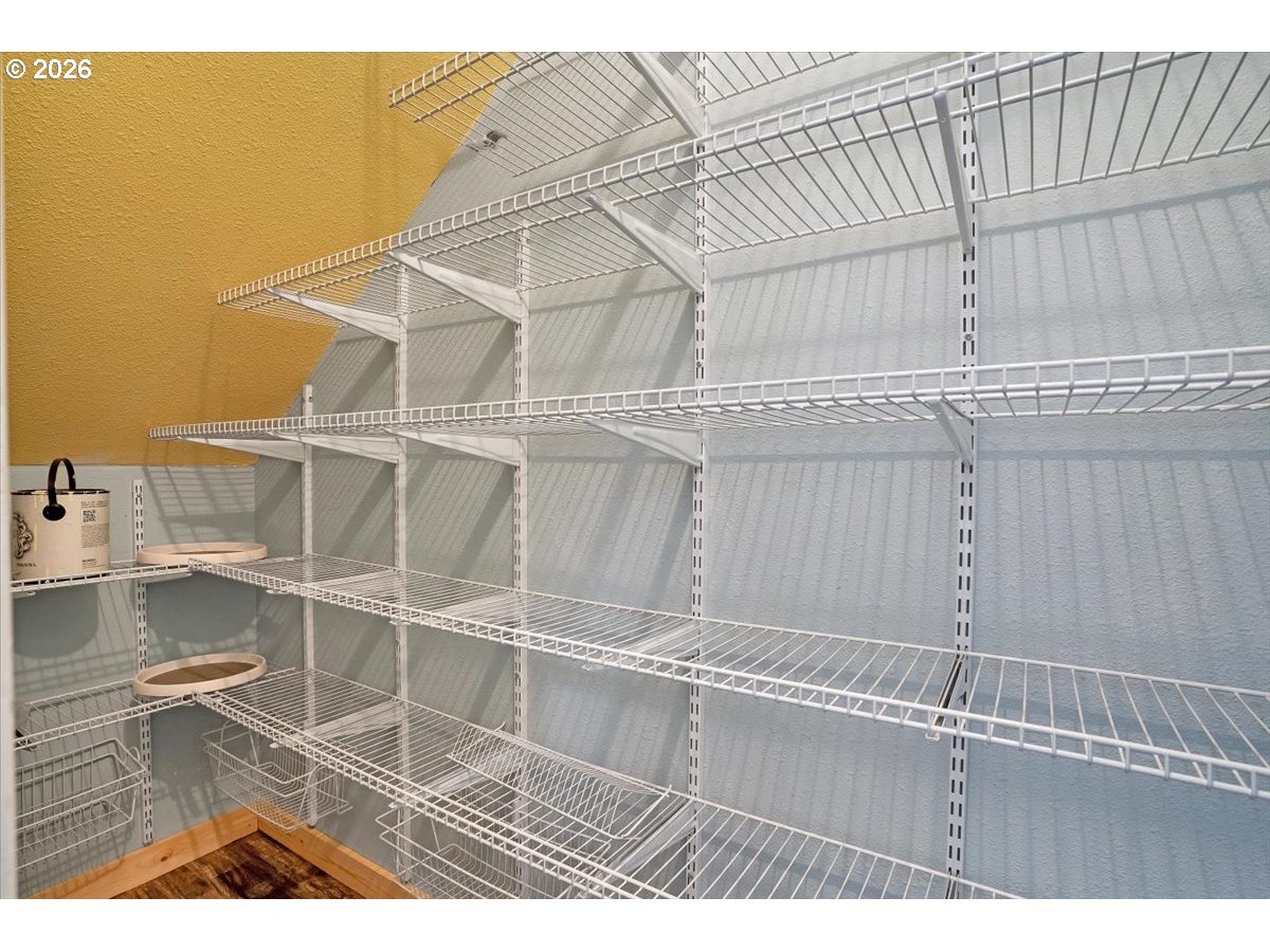 566 North Bear Creek Road Otis, OR 97368 - Photo 15 of 40 a black white and black white and white walls