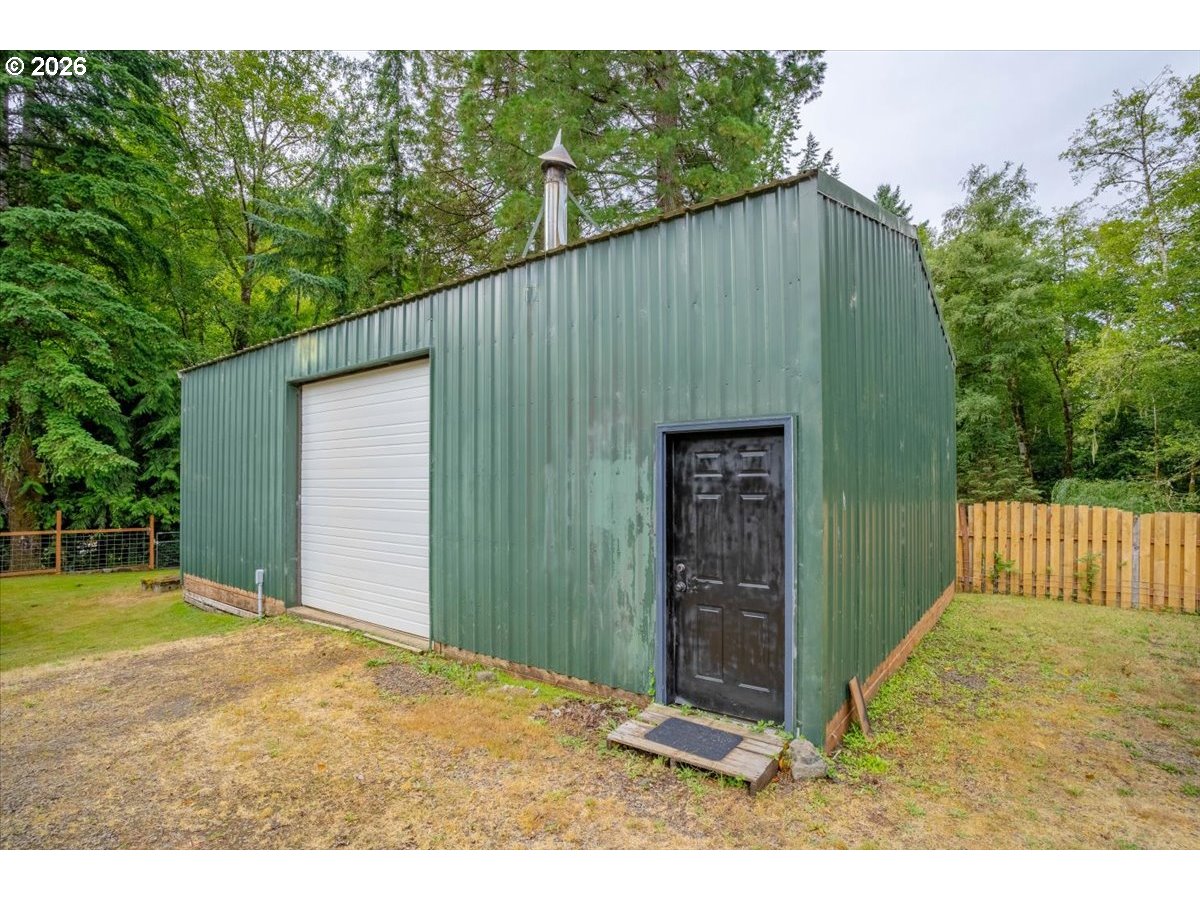 566 North Bear Creek Road Otis, OR 97368 - Photo 32 of 40 a house view with a outdoor space