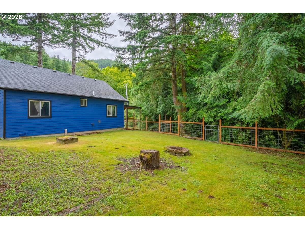 566 North Bear Creek Road Otis, OR 97368 - Photo 34 of 40 a view of a swimming pool with an outdoor space