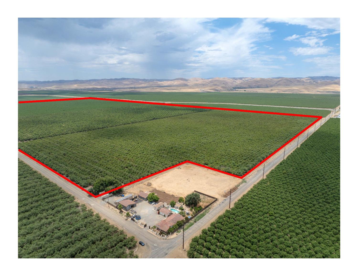 18401 Davis Road Patterson, CA 95363 - Photo 5 of 20 a view of a field with an trees