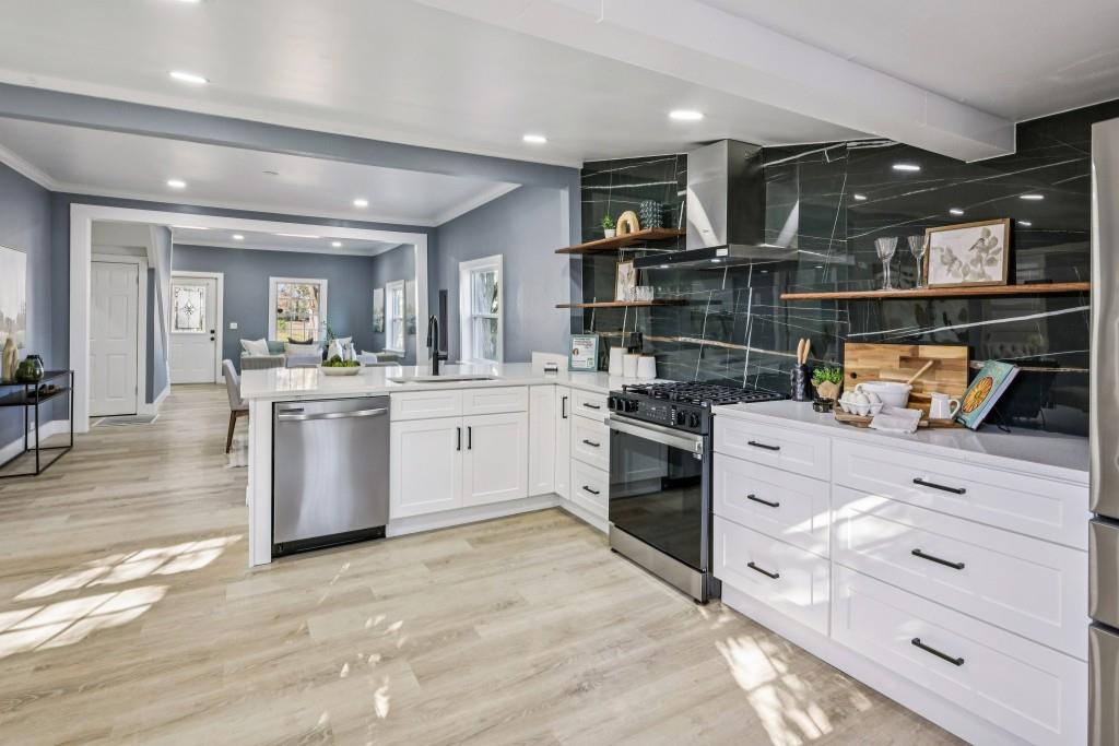 1504 Hardin Avenue Atlanta, GA 30337 - Photo 14 of 50 a kitchen with a sink window and cabinets