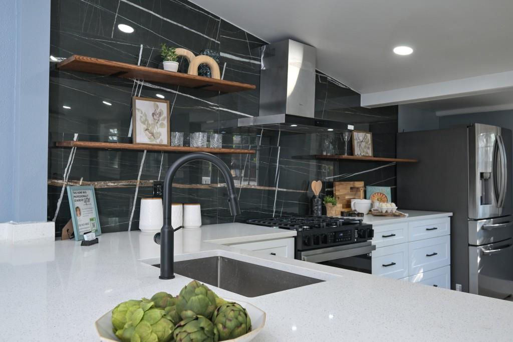 1504 Hardin Avenue Atlanta, GA 30337 - Photo 15 of 50 a kitchen with refrigerator and window