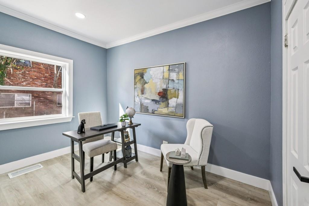 1504 Hardin Avenue Atlanta, GA 30337 - Photo 26 of 50 a living room with furniture and a window