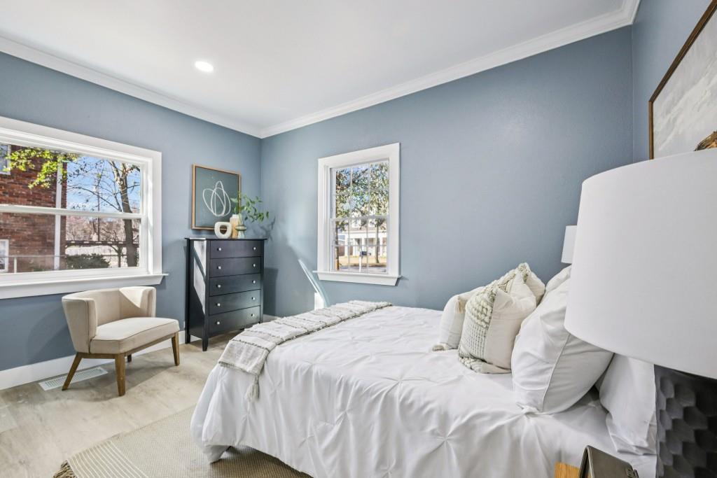 1504 Hardin Avenue Atlanta, GA 30337 - Photo 28 of 50 a bedroom with a bed and a large window
