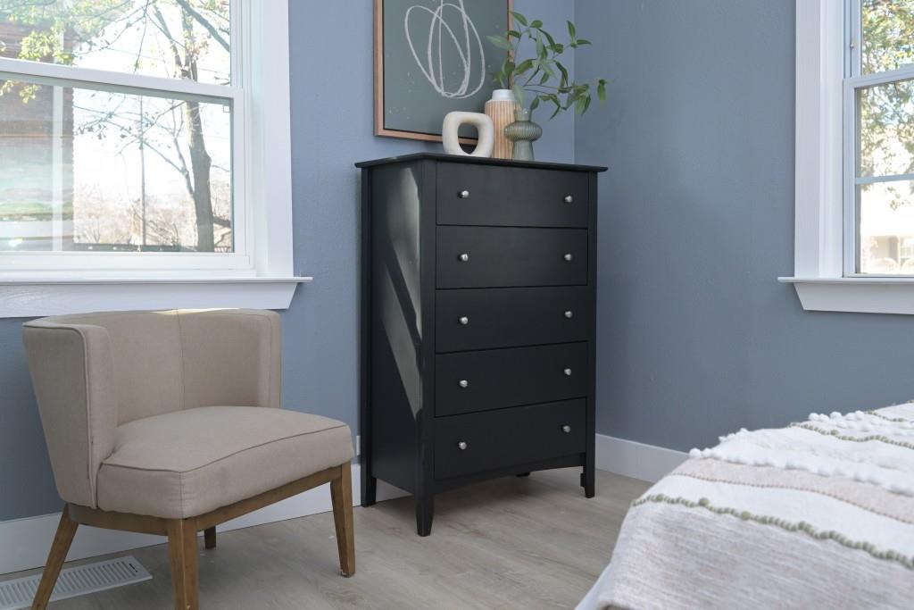 1504 Hardin Avenue Atlanta, GA 30337 - Photo 30 of 50 a bedroom with a bed a window and chair