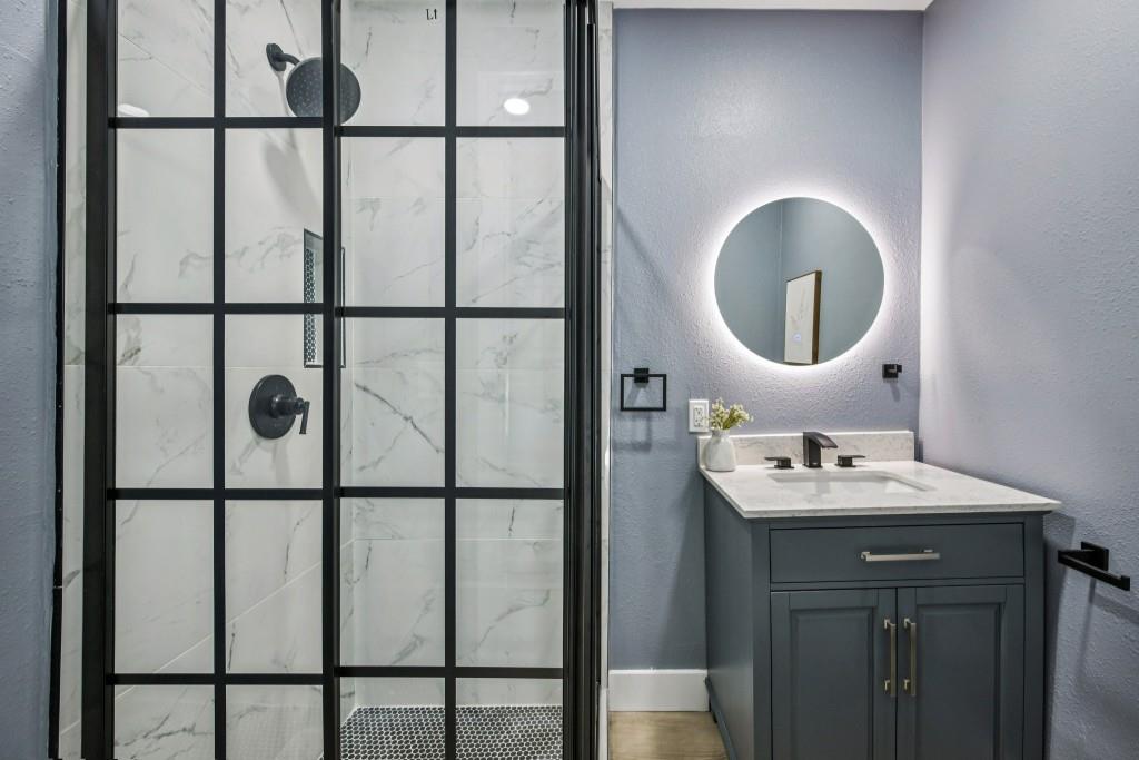 1504 Hardin Avenue Atlanta, GA 30337 - Photo 31 of 50 a bathroom with a sink and a mirror