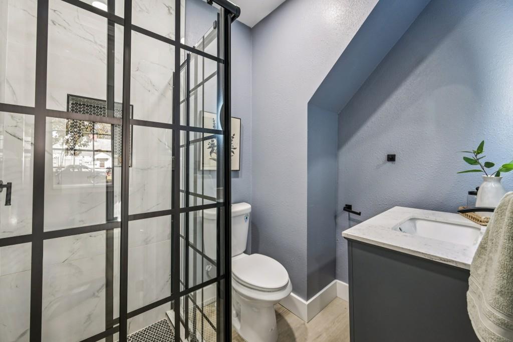 1504 Hardin Avenue Atlanta, GA 30337 - Photo 32 of 50 a bathroom with a sink toilet and shower