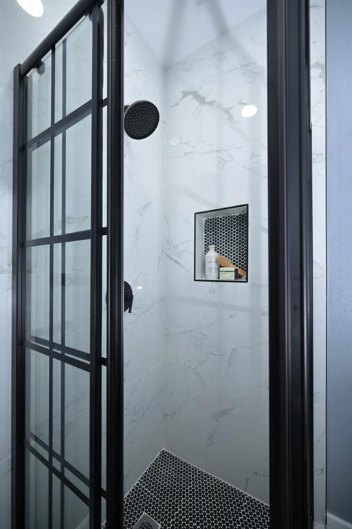 1504 Hardin Avenue Atlanta, GA 30337 - Photo 33 of 50 a bathroom with a shower and a window