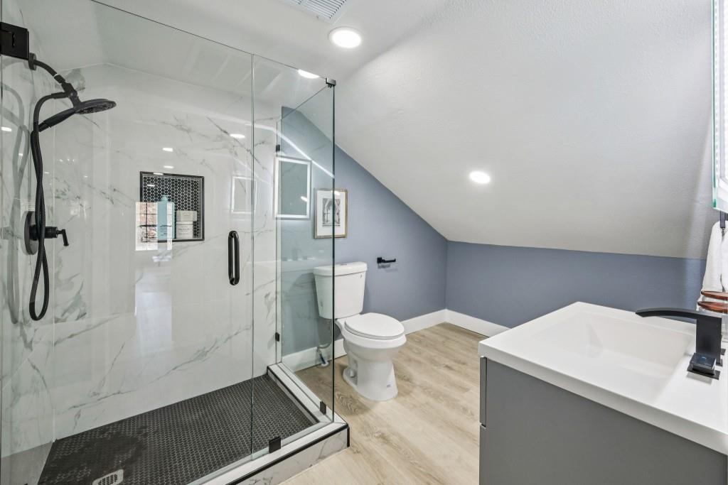 1504 Hardin Avenue Atlanta, GA 30337 - Photo 38 of 50 a bathroom with a sink a toilet and shower