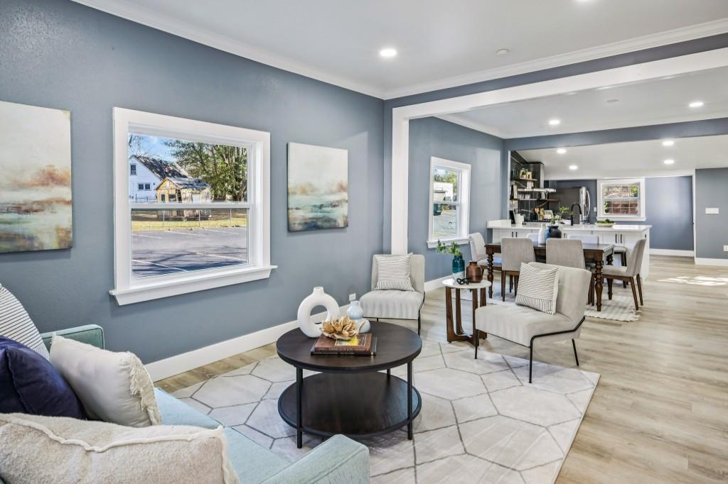 1504 Hardin Avenue Atlanta, GA 30337 - Photo 4 of 50 a living room with furniture and wooden floor