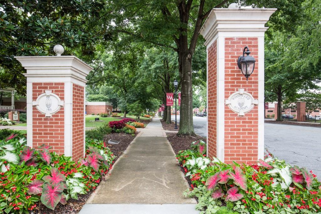1504 Hardin Avenue Atlanta, GA 30337 - Photo 45 of 50 a front view of a house with a yard and fountain