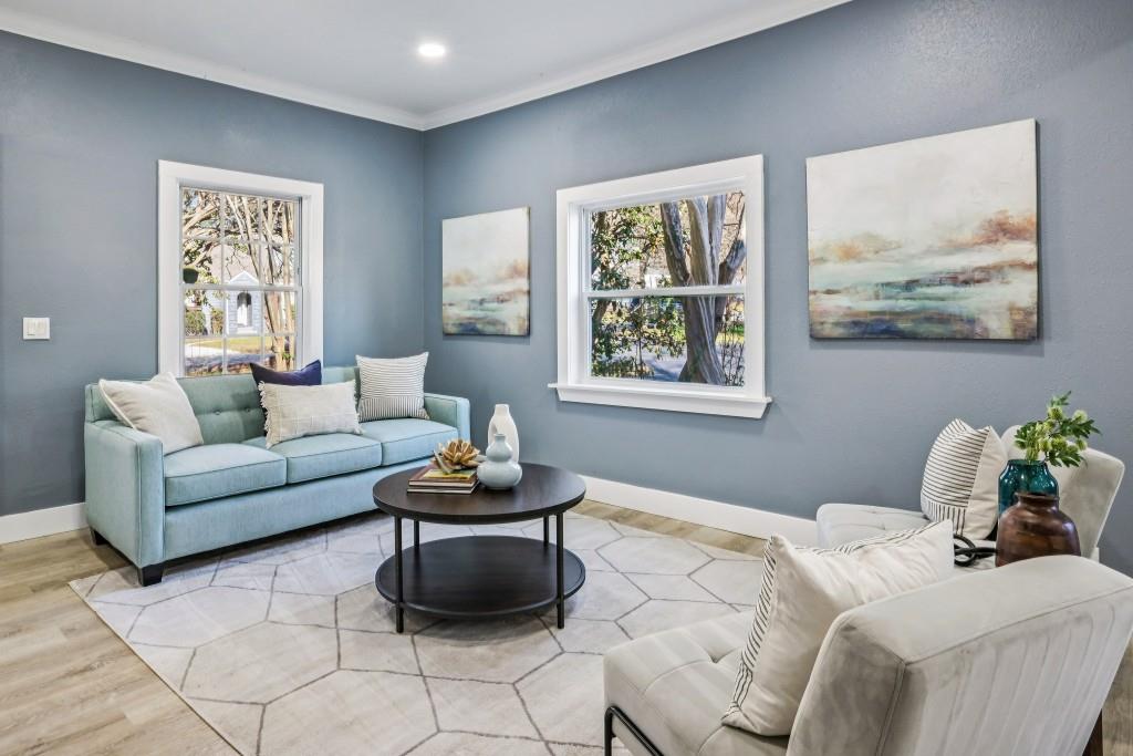 1504 Hardin Avenue Atlanta, GA 30337 - Photo 7 of 50 a living room with furniture and painting on the wall