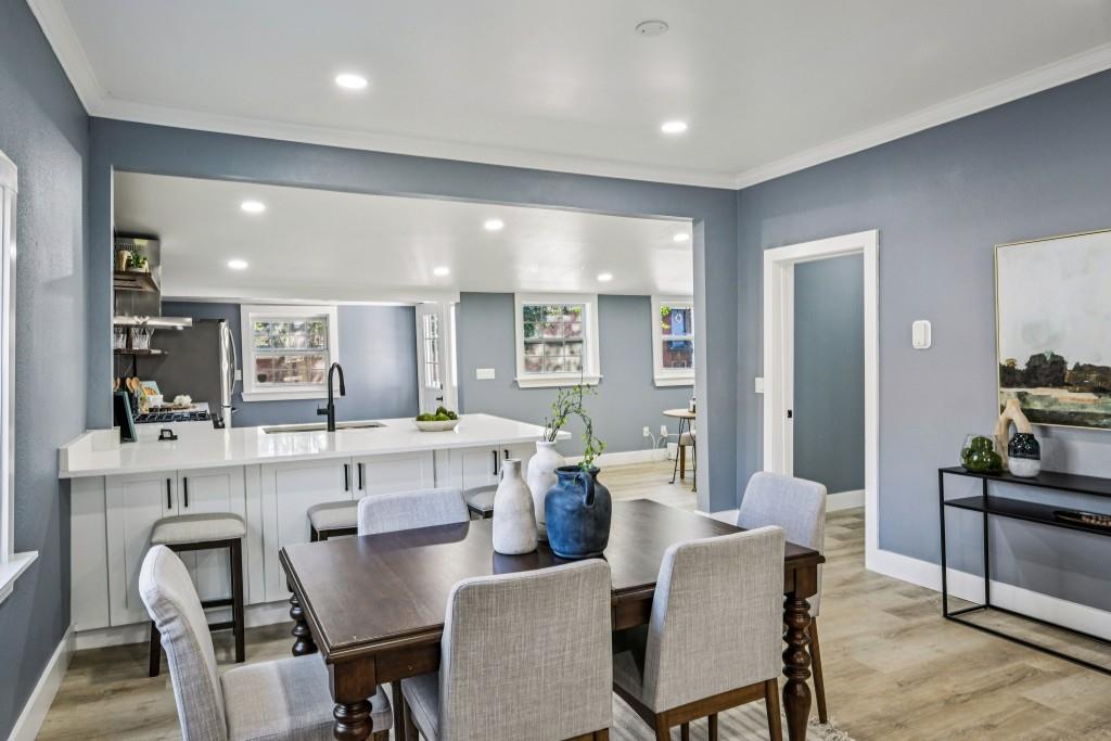 1504 Hardin Avenue Atlanta, GA 30337 - Photo 10 of 50 a large kitchen with a table and chairs