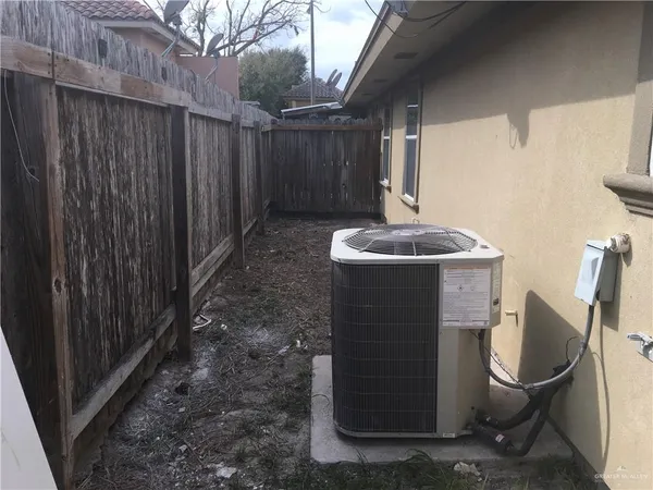 a bathroom with sink a toilet and mirror