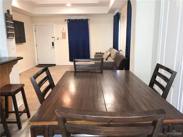 a living room with furniture and a couch