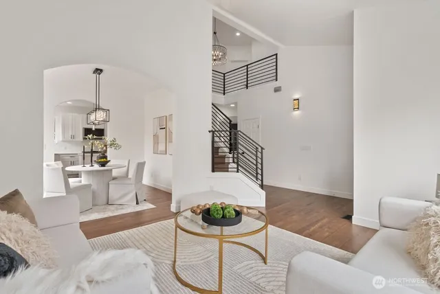 a living room with furniture and a rug