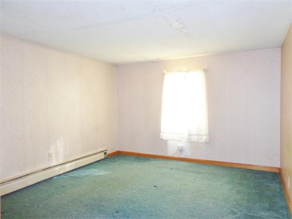 58 Stafford Road Monson, MA 01057 - Photo 6 of 26 an empty room with a window