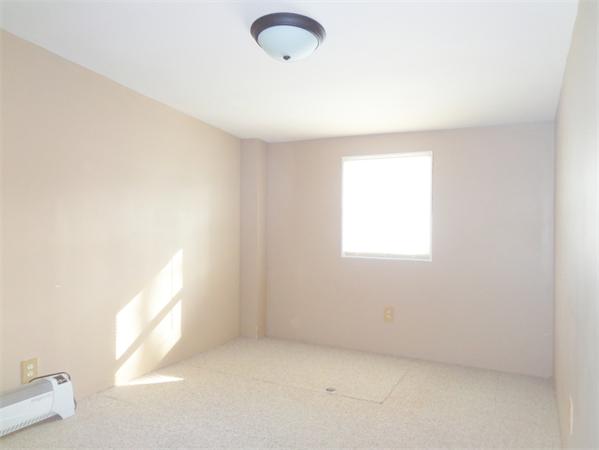 58 Stafford Road Monson, MA 01057 - Photo 10 of 26 an empty room with a window