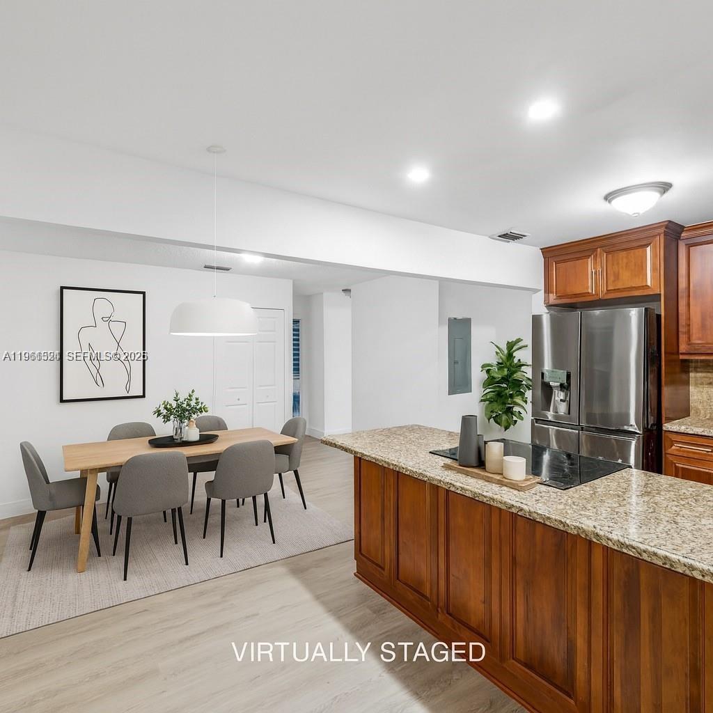 3250 Southwest 116th Place Miami, FL 33165 - Photo 5 of 15 a view of a dining room with furniture