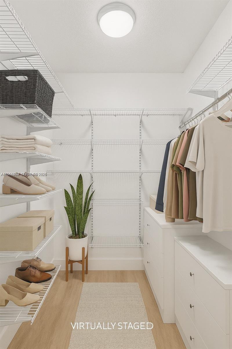 3250 Southwest 116th Place Miami, FL 33165 - Photo 9 of 15 a view of a walk in closet