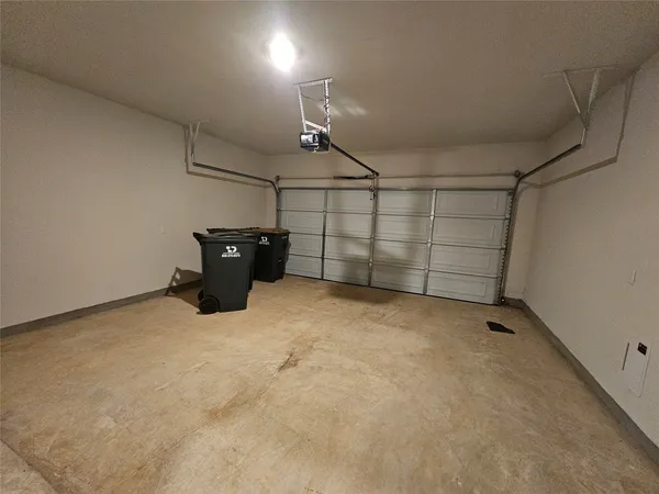 a kitchen with a sink stove and refrigerator