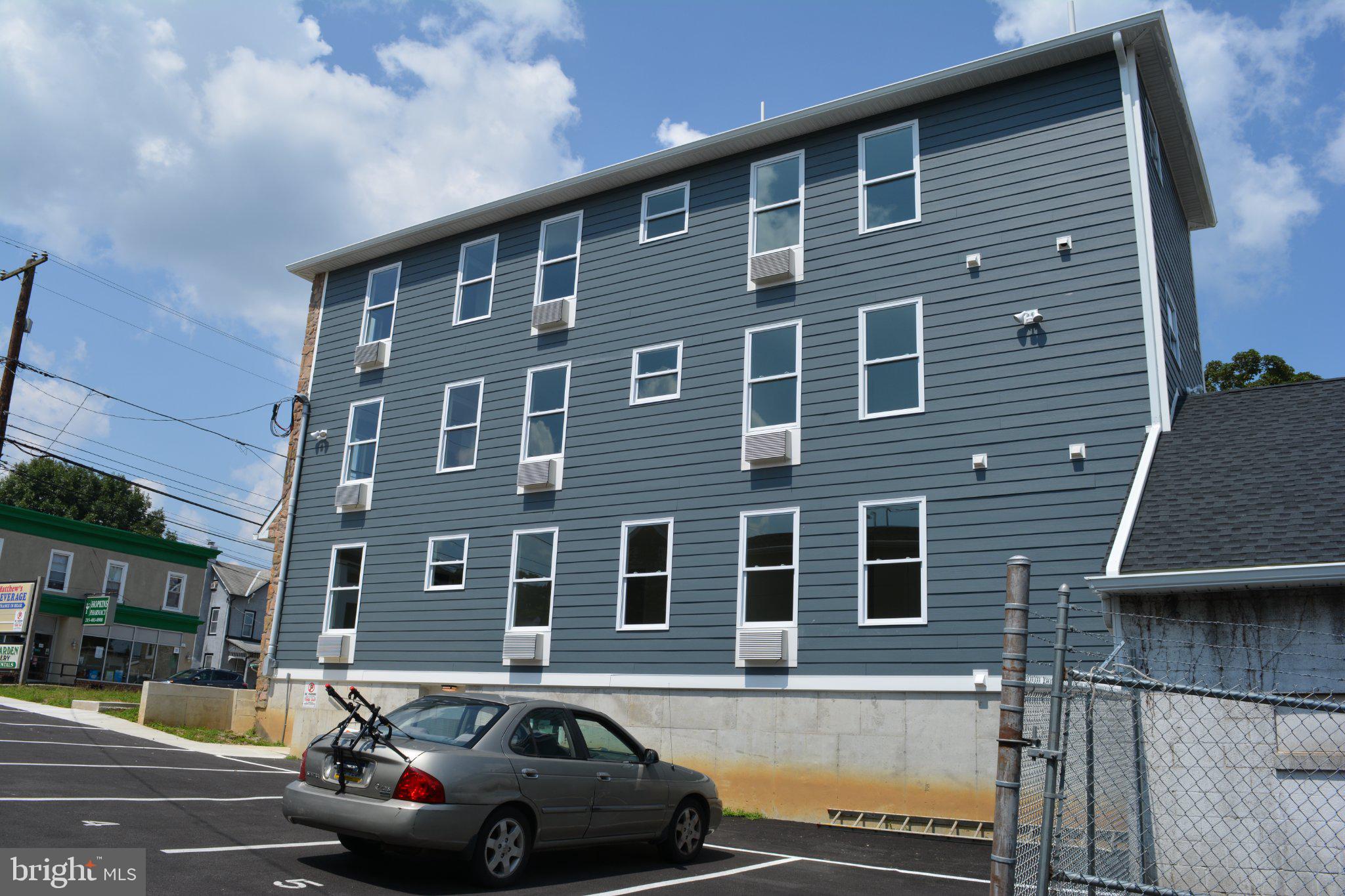 7631 Ridge Avenue, Unit 3 Philadelphia, PA 19128 - Photo 1 of 16 Modern multi-unit residence exterior.