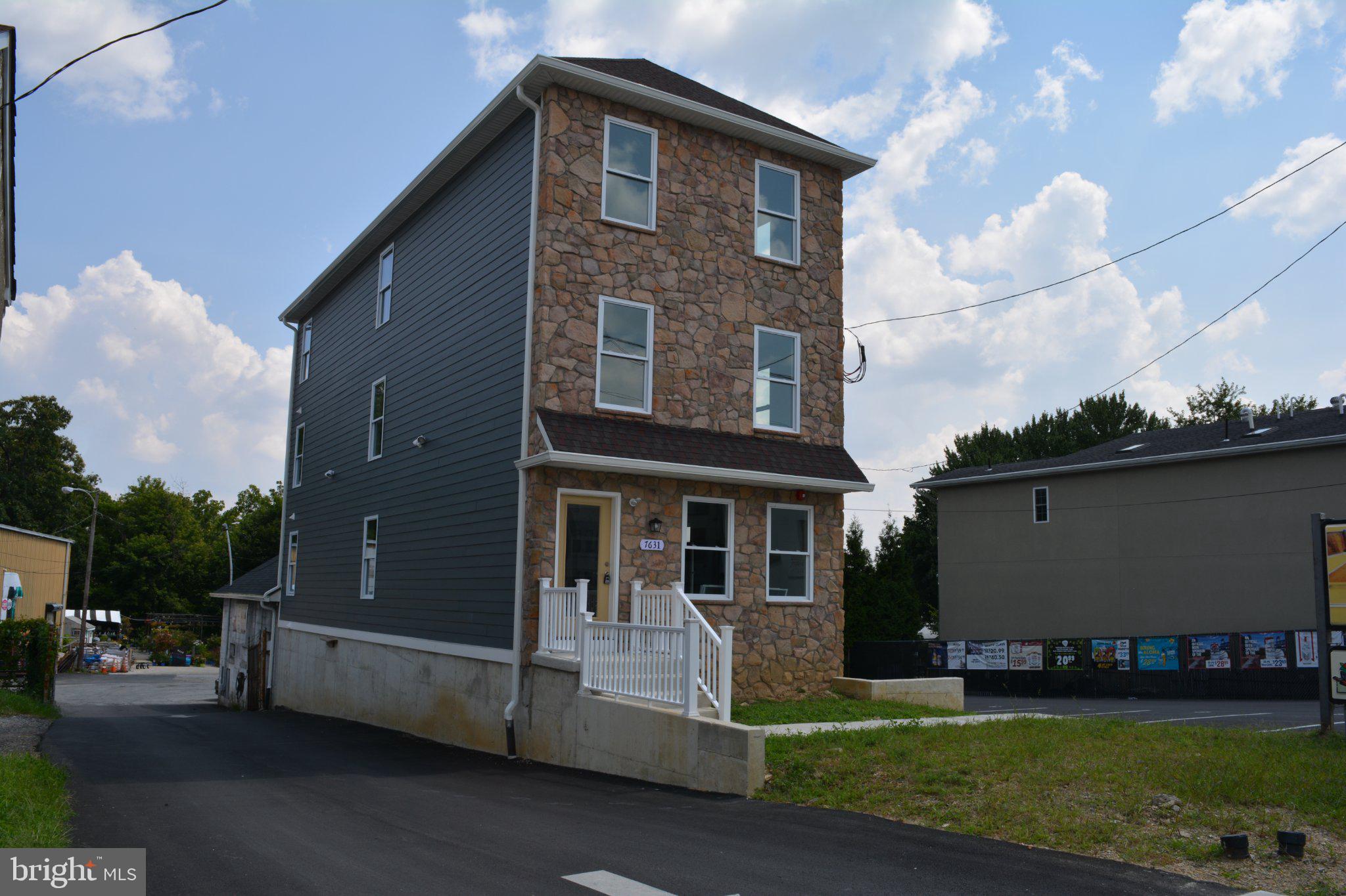 7631 Ridge Avenue, Unit 3 Philadelphia, PA 19128 - Photo 3 of 16 Modern stone-clad home with charm.