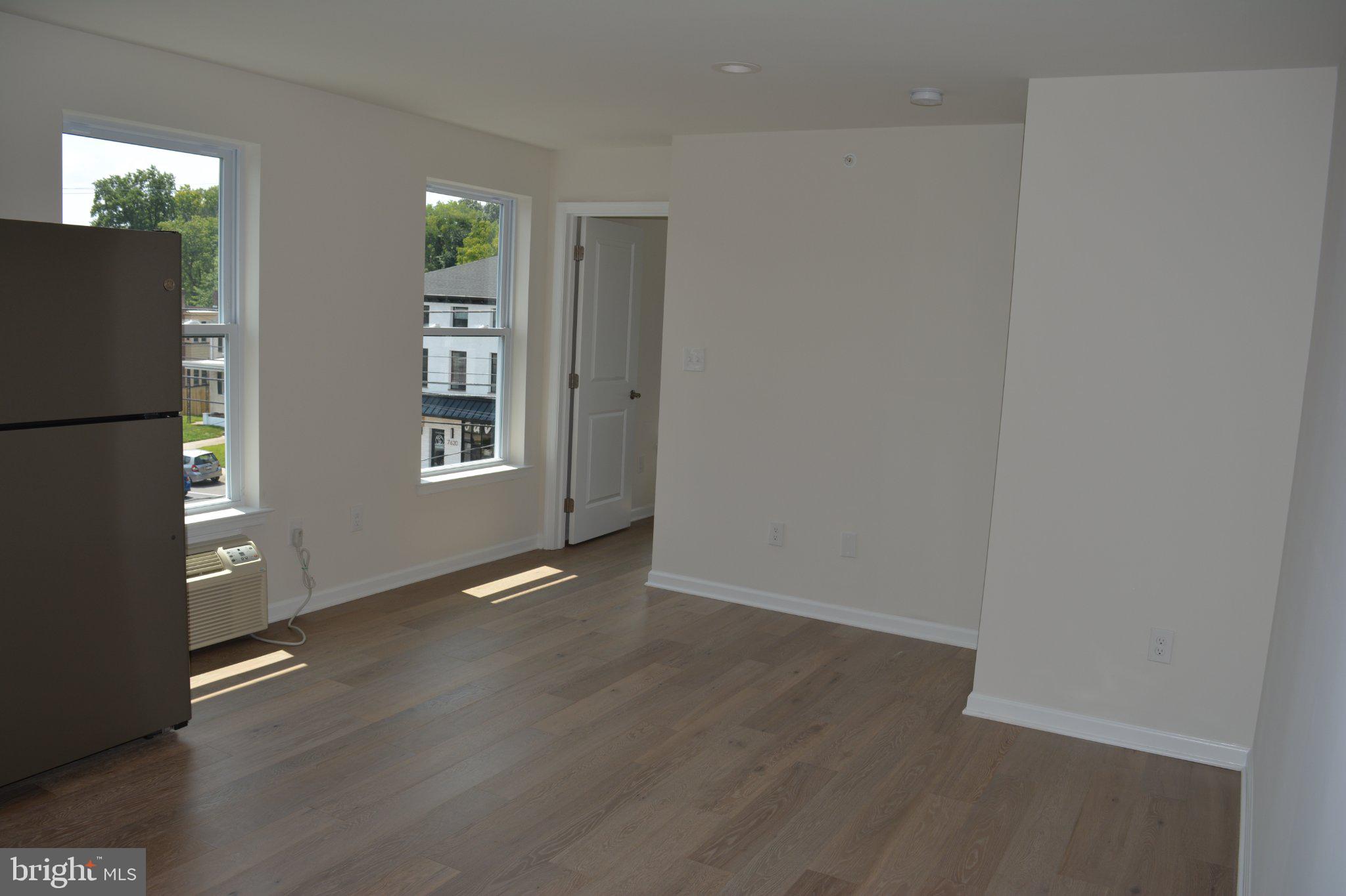 7631 Ridge Avenue, Unit 3 Philadelphia, PA 19128 - Photo 4 of 16 Bright and airy open space awaits.