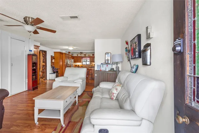 a living room with furniture and a table