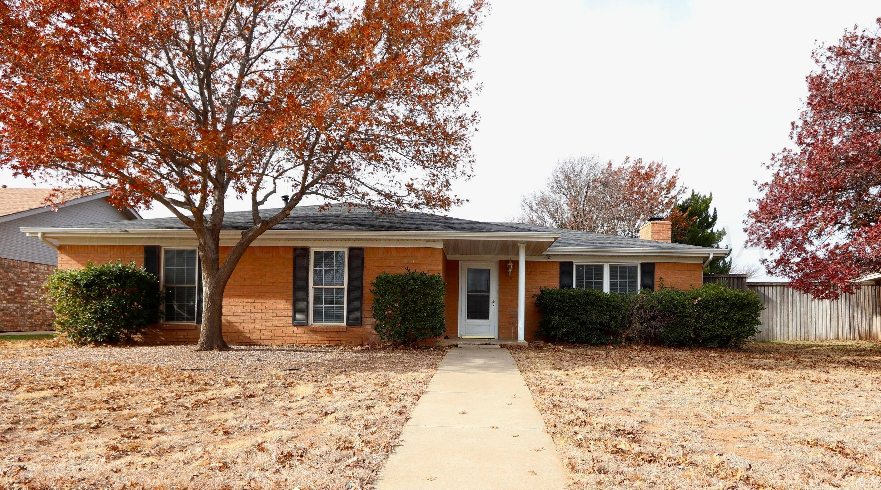 7916 Fenley Drive Amarillo, TX 79121 - Photo 1 of 23 front view of a house with a yard