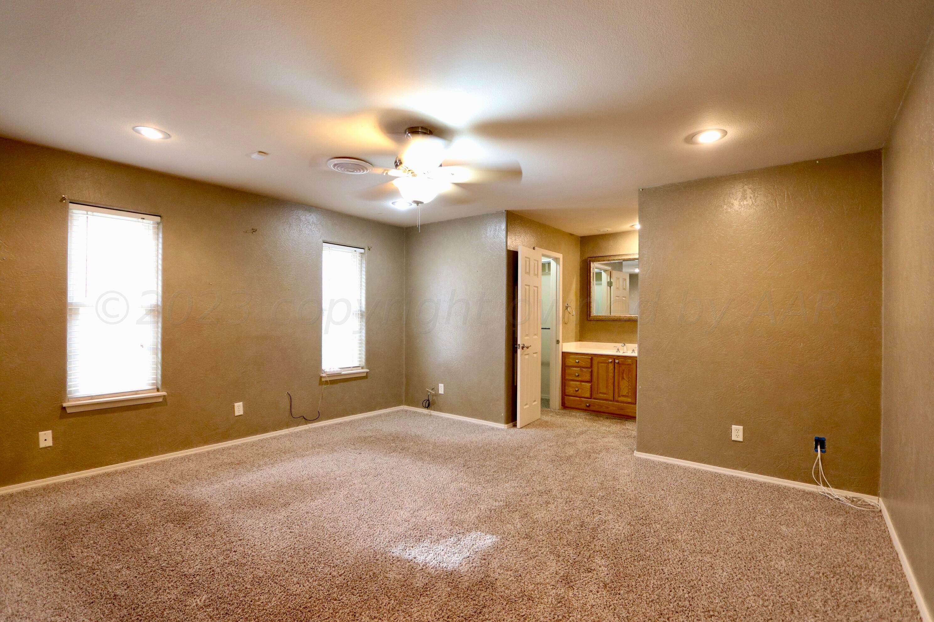 7916 Fenley Drive Amarillo, TX 79121 - Photo 14 of 23 a view of an empty room with a window