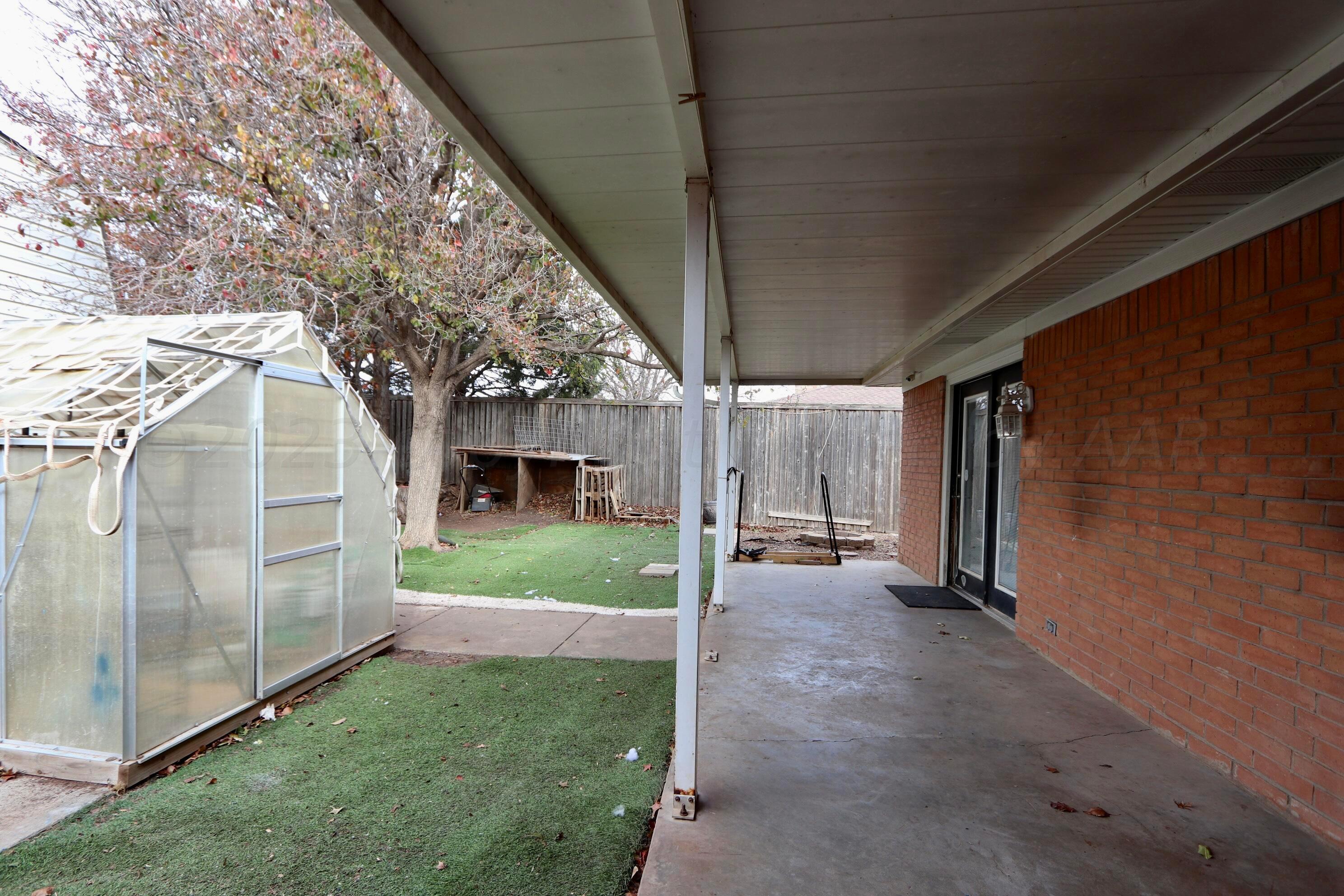 7916 Fenley Drive Amarillo, TX 79121 - Photo 17 of 23 a view of a back yard of the house