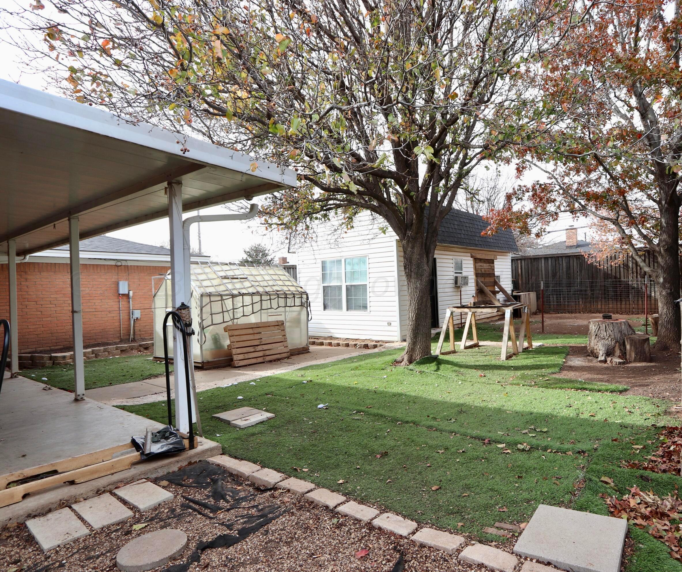 7916 Fenley Drive Amarillo, TX 79121 - Photo 19 of 23 a front view of a house with a yard