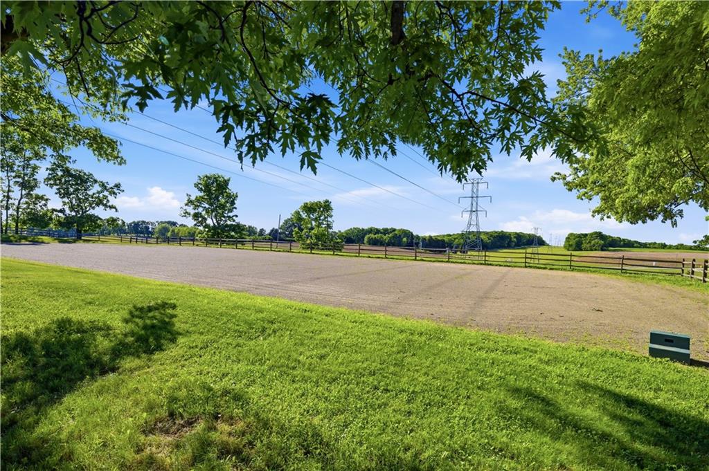 121 Brewer Road Saxonburg, PA 16056 - Photo 7 of 49 a view of a lake with a big yard and potted plants