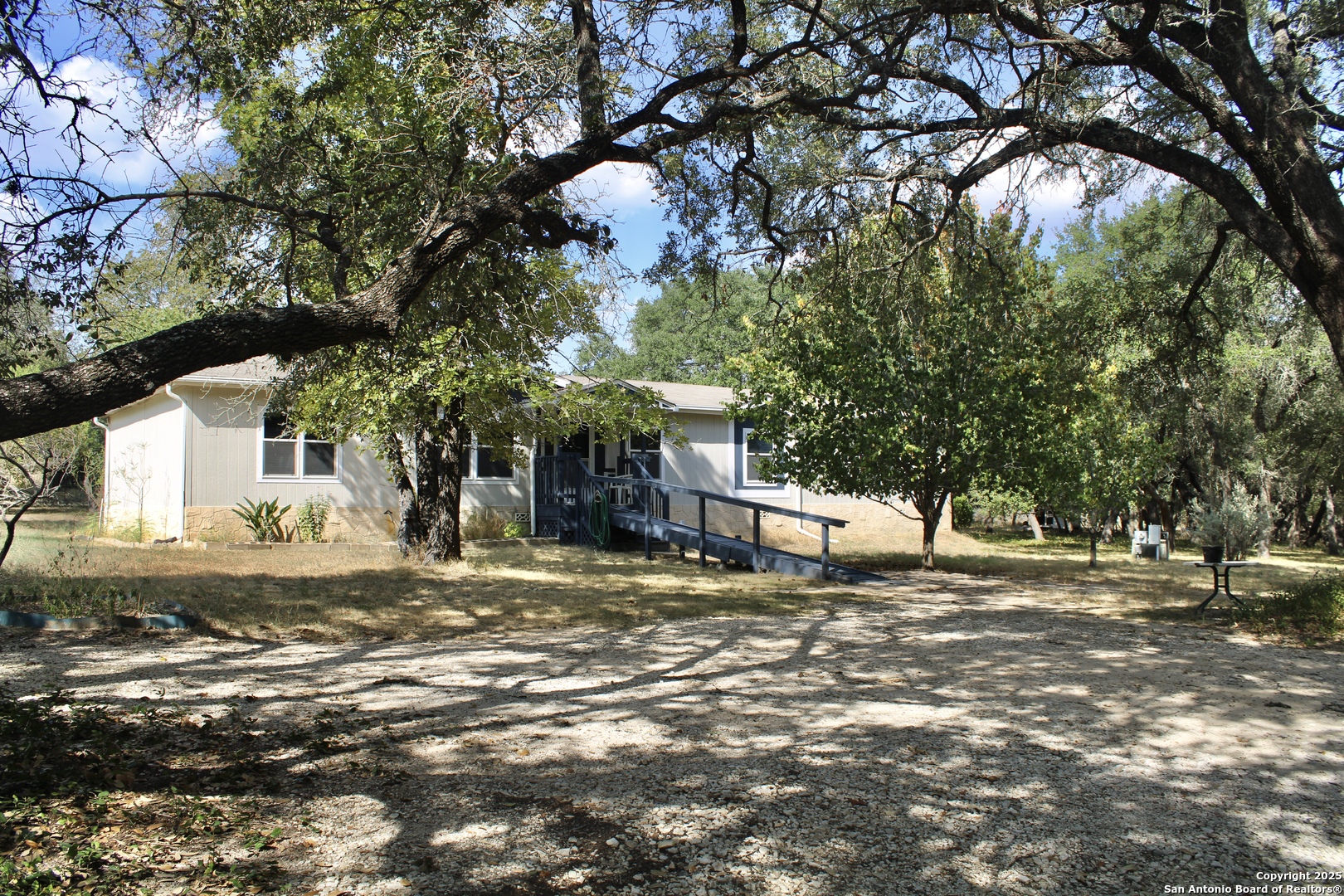 285 Rhonda Drive Lytle, TX 78052 - Photo 18 of 51 a view of a house with a tree in the background