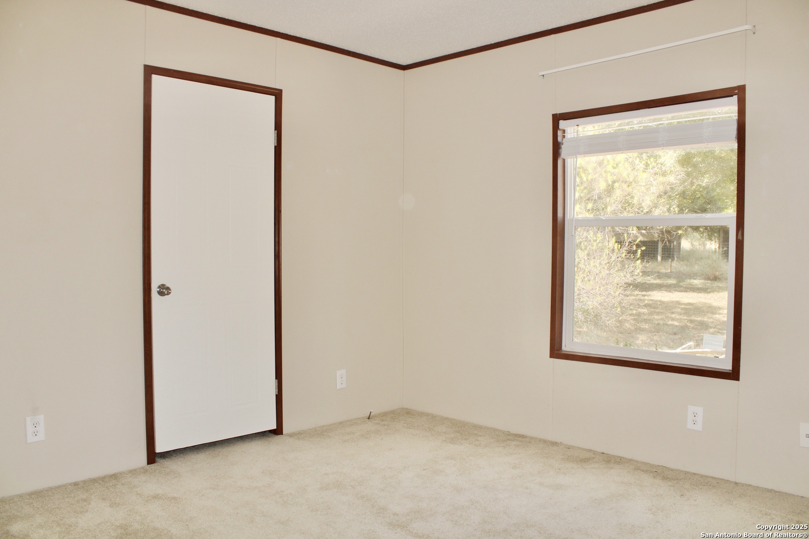 285 Rhonda Drive Lytle, TX 78052 - Photo 28 of 51 a view of an empty room with a window
