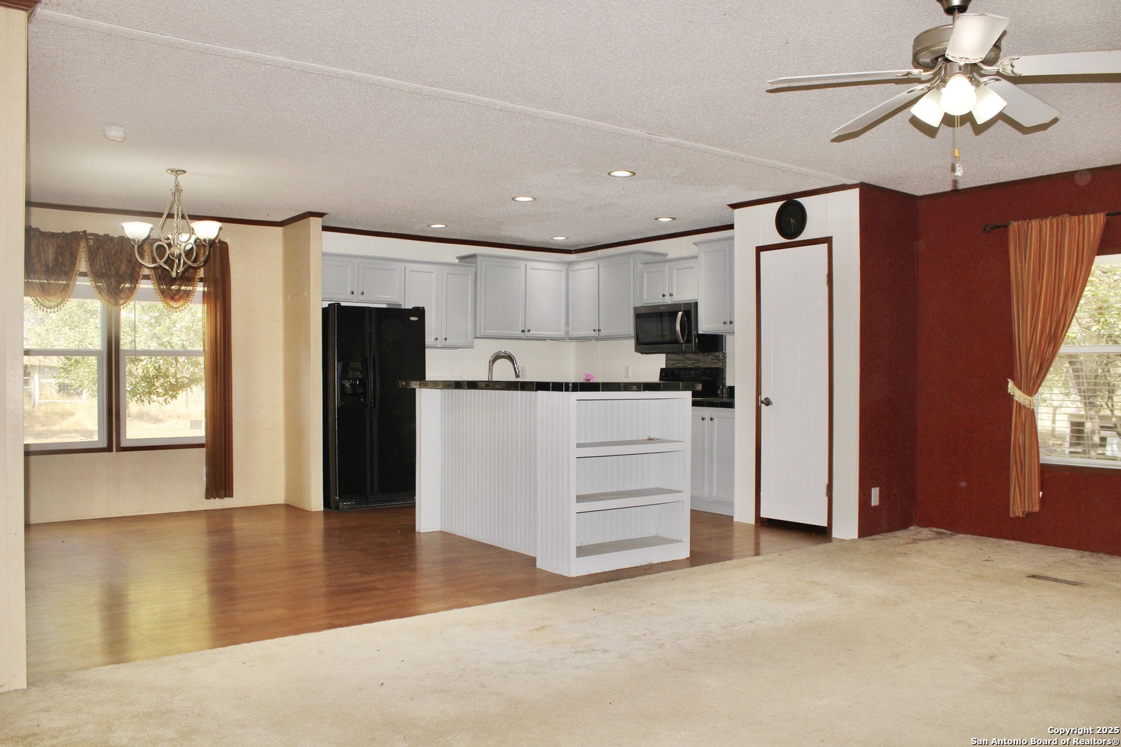 285 Rhonda Drive Lytle, TX 78052 - Photo 5 of 51 a view of kitchen with refrigerator and window