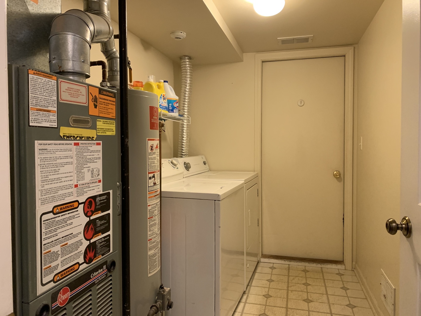 2927 Rutland Circle, Unit 101 Naperville, IL 60564 - Photo 11 of 11 a bathroom with a sink and mirror