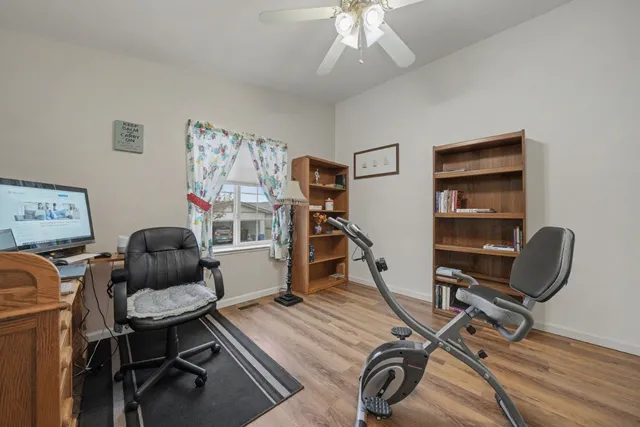 a spacious bathroom with a sink toilet and shower