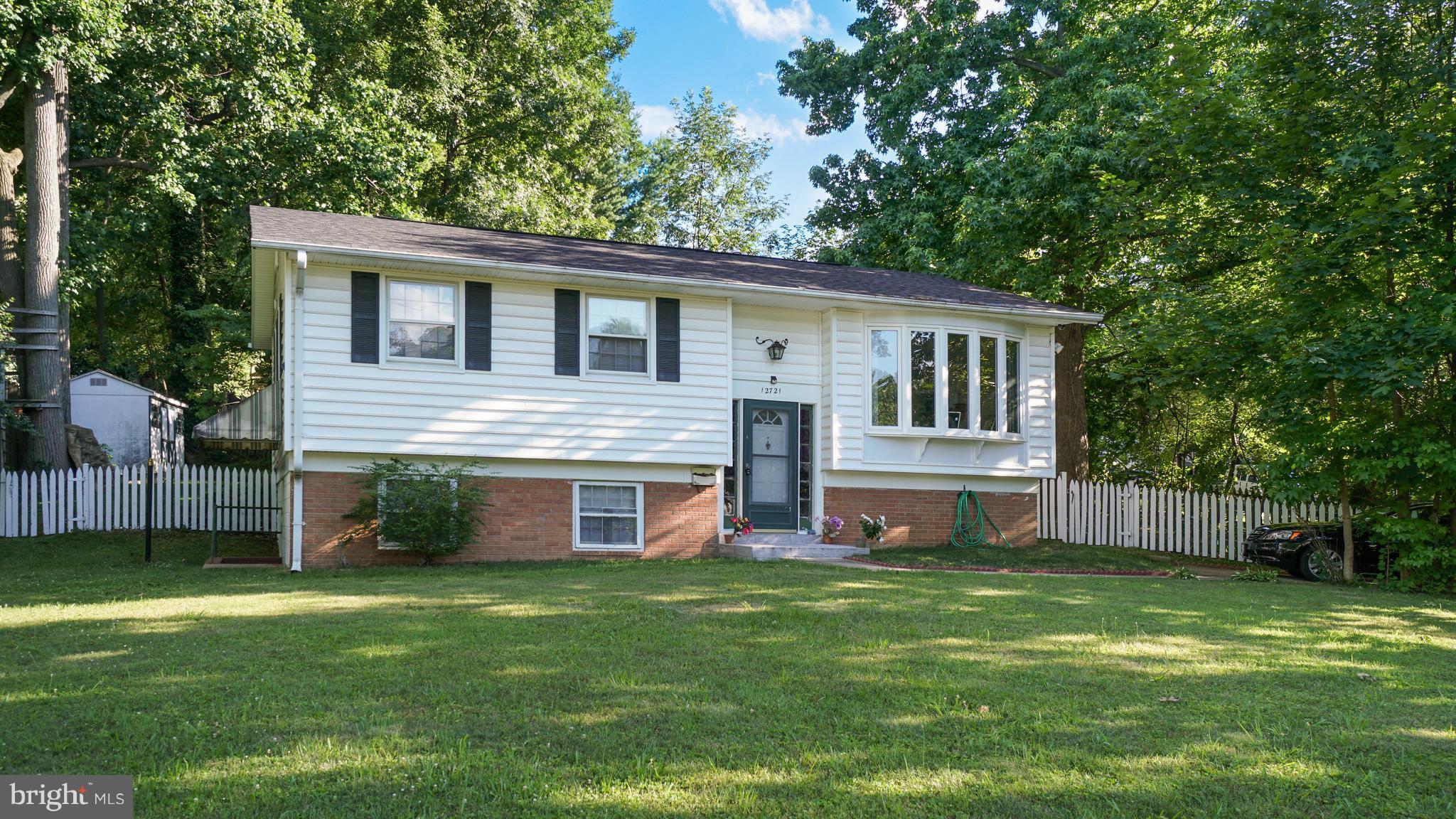 12721 Barbara Road Silver Spring, MD 20906 - Photo 2 of 30 a front view of house with yard