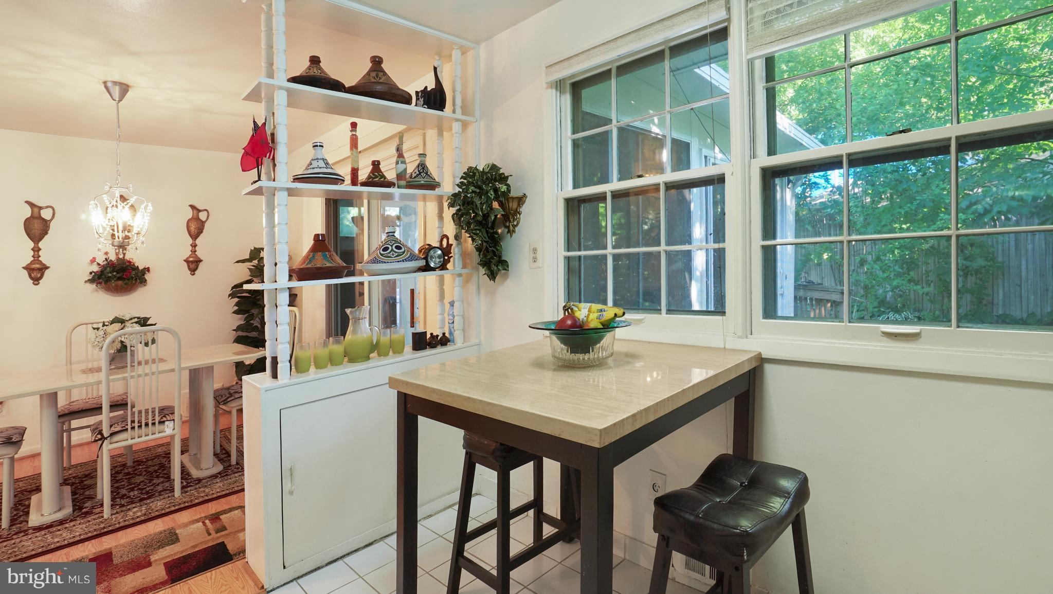 12721 Barbara Road Silver Spring, MD 20906 - Photo 11 of 30 a view of a center that has a table and chairs in it