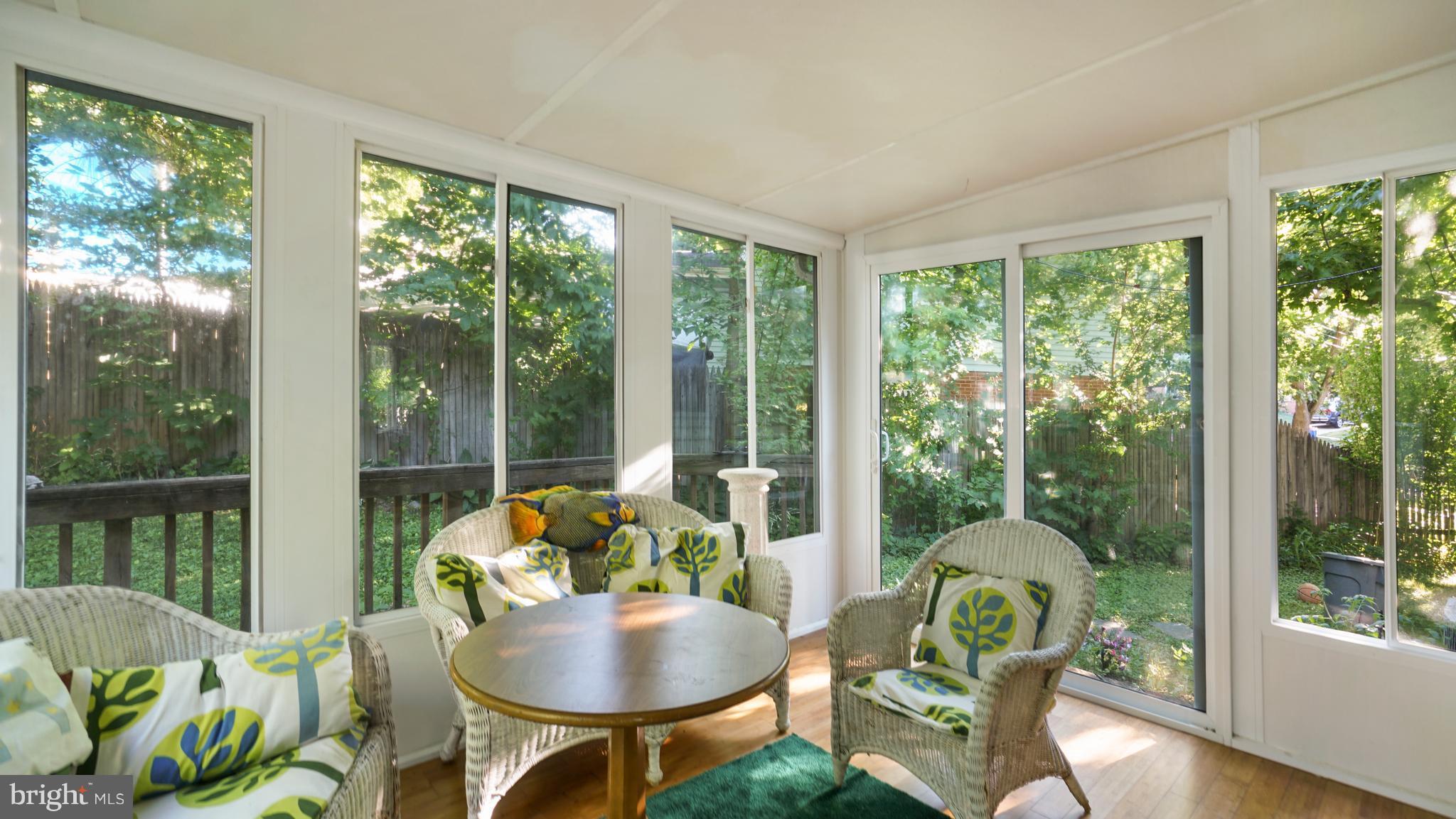 12721 Barbara Road Silver Spring, MD 20906 - Photo 25 of 30 a living room with patio furniture and a potted plant