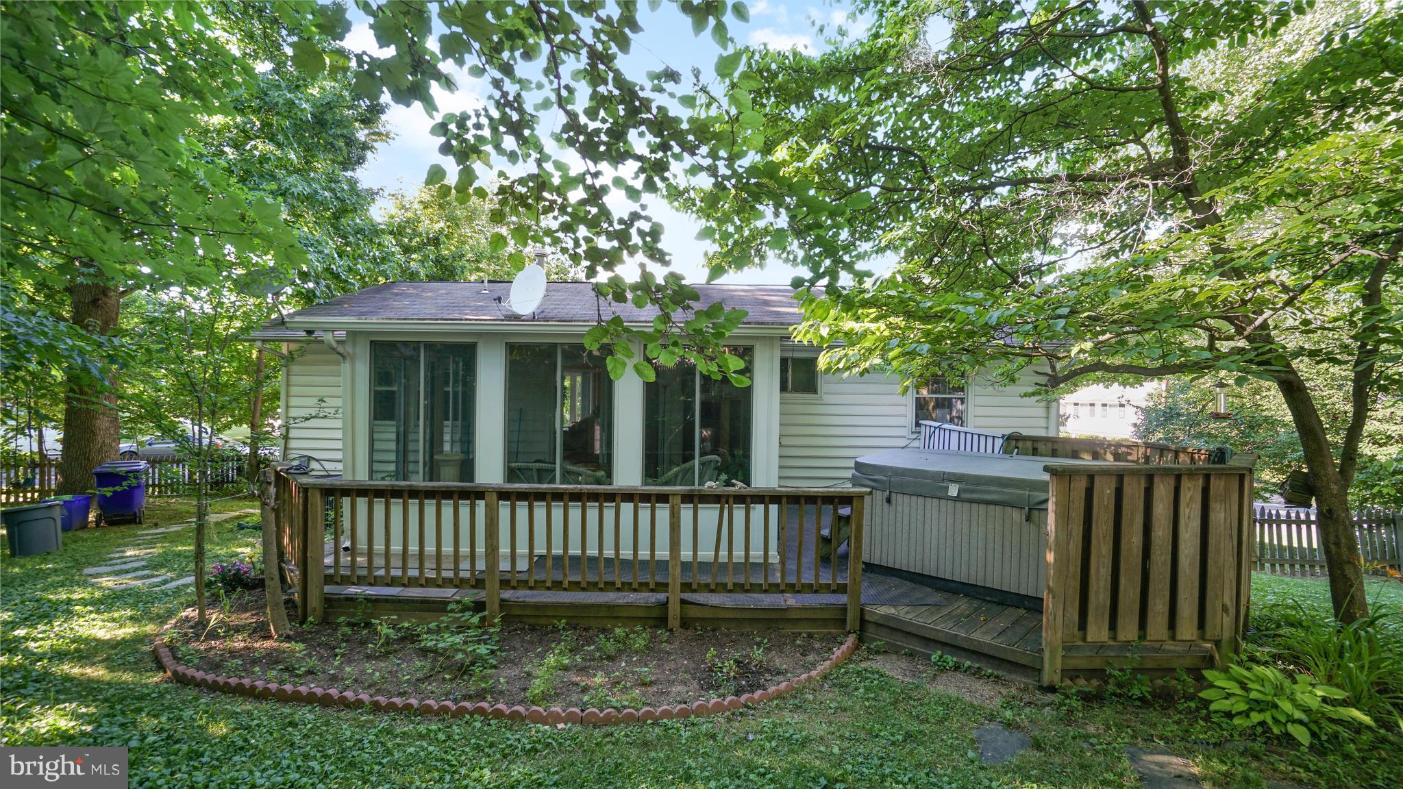 12721 Barbara Road Silver Spring, MD 20906 - Photo 29 of 30 a view of a house with a yard plants and large tree