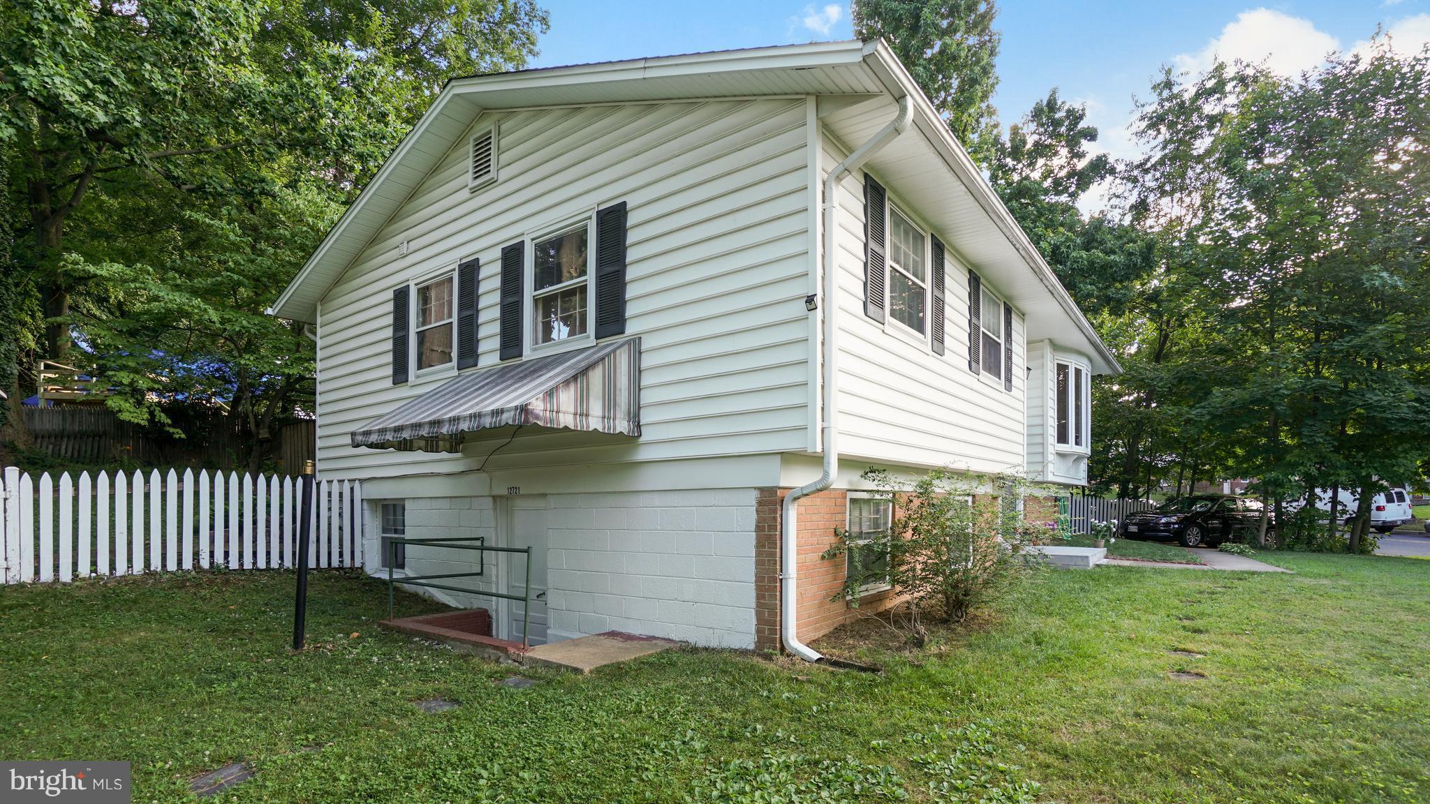 12721 Barbara Road Silver Spring, MD 20906 - Photo 30 of 30 a front view of a house with a yard