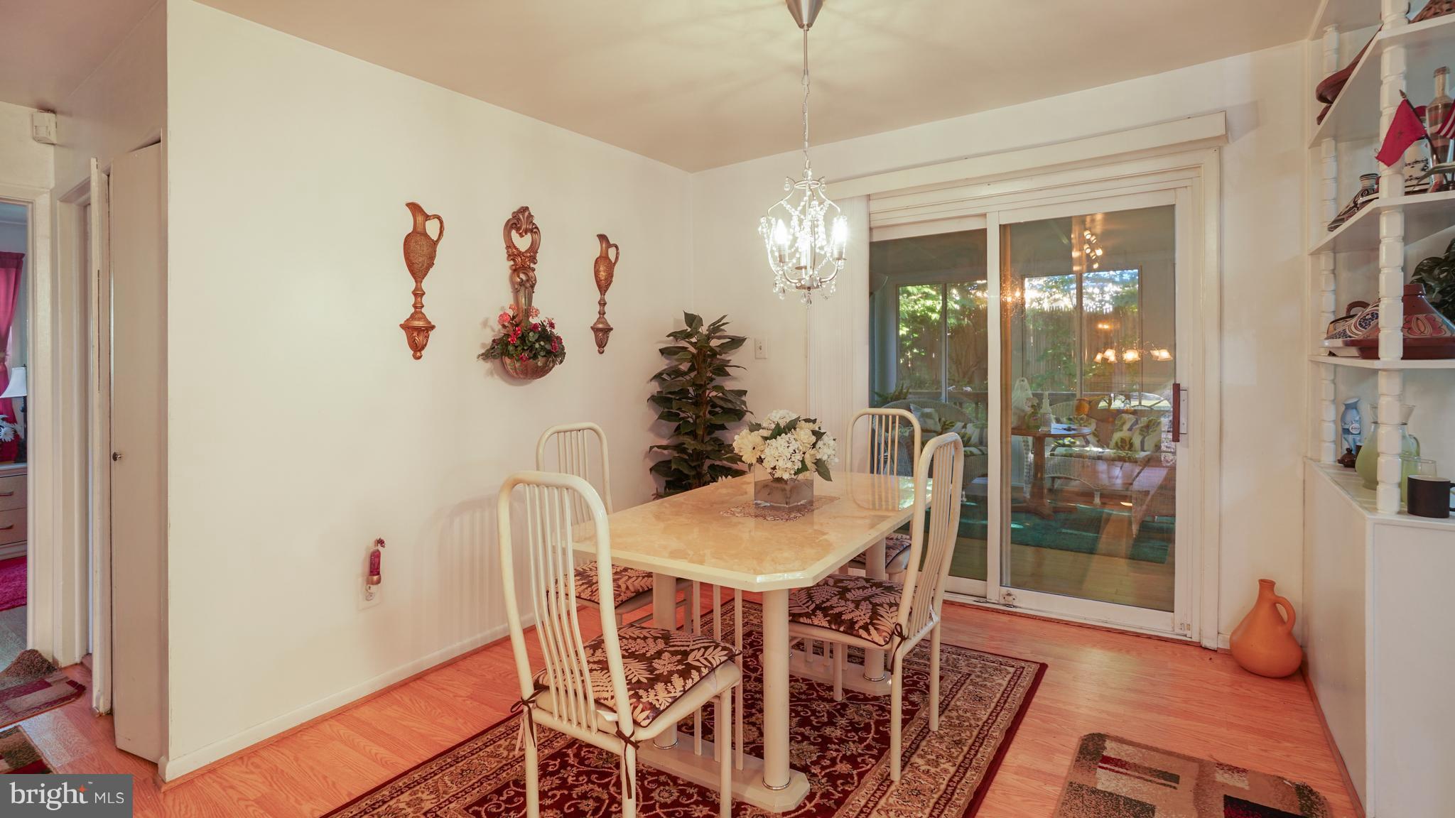12721 Barbara Road Silver Spring, MD 20906 - Photo 7 of 30 a dining room with furniture and window